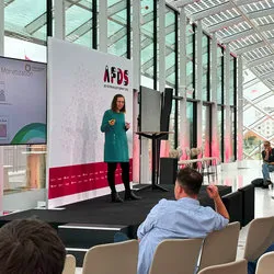 Sabine Schaller speaking on stage at the Ad Filtering Dev Summit '23